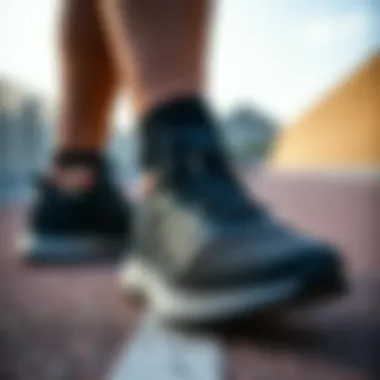 Versatile Sports Footwear Dynamic black Adidas footwear suitable for various sports activities