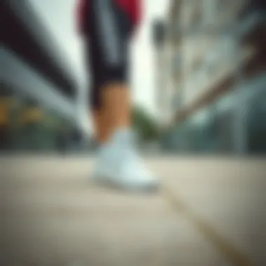 Woman's outfit paired with white sports shoes in an urban setting