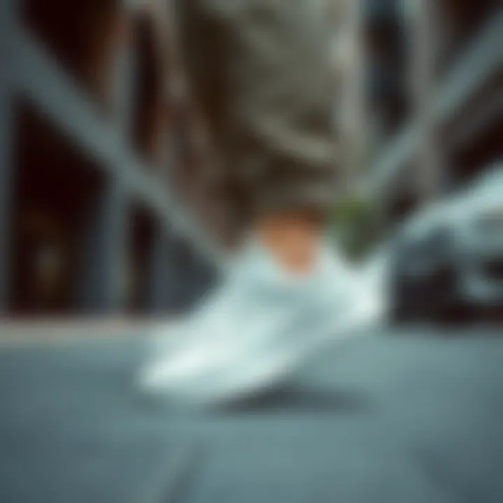 A fashionable outfit paired with white running shoes in an urban setting.