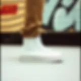 Stylish white high-top Vans showcasing sports fashion