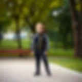 A child wearing a stylish tracksuit in a park setting, showcasing comfort and style.