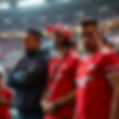 Fans Supporting Galatasaray Fans showcasing their support wearing the latest Galatasaray jersey at a stadium.