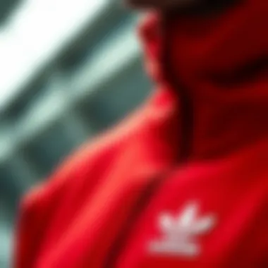 Close-up of high-quality fabric used in red Adidas tracksuit