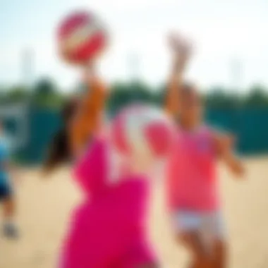 Usage of the Pink Volleyball in Play Players engaging with a pink volleyball during a match.