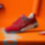 Stylish red New Balance sneakers displayed on a vibrant background