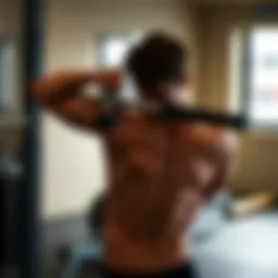 Demonstration of triceps pushdown exercise technique